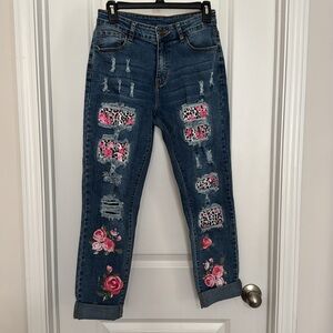 Boutiques jeans with flowers and animal print